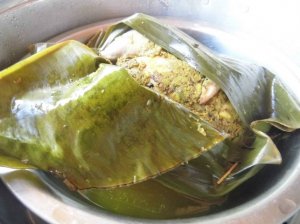 Chicken steamed in a banana leaf